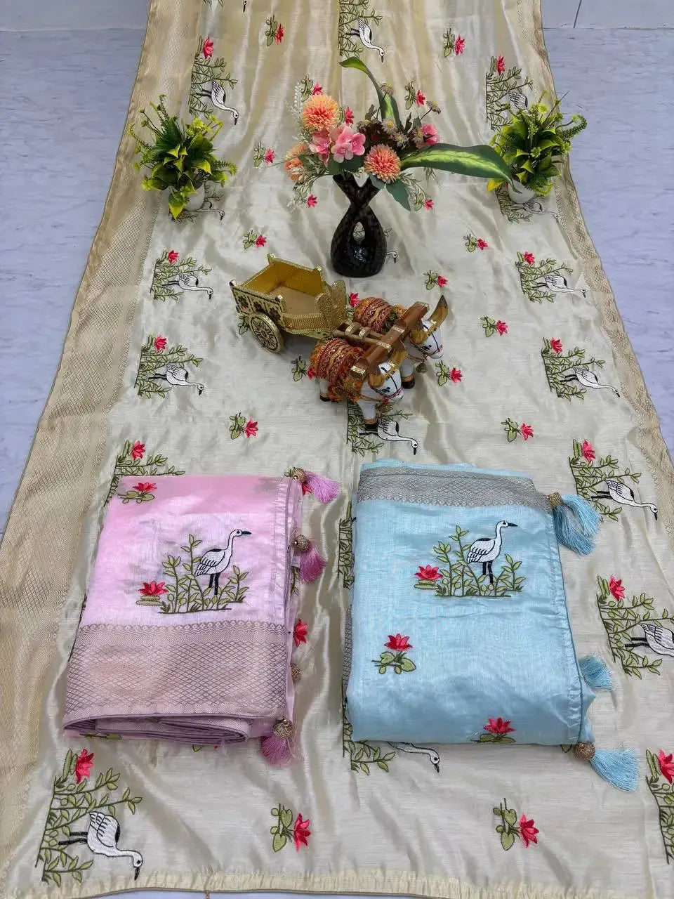 Close-up flat lay of Sky Blue Thread Embroidered Jacquard Saree with blouse